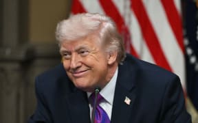 US President Donald Trump smiles during a roundtable on Ratepayer Protection Pledge in the Indian Treaty Room at the Eisenhower Executive Office Building on the White House campus in Washington, DC, on March 4, 2026.
