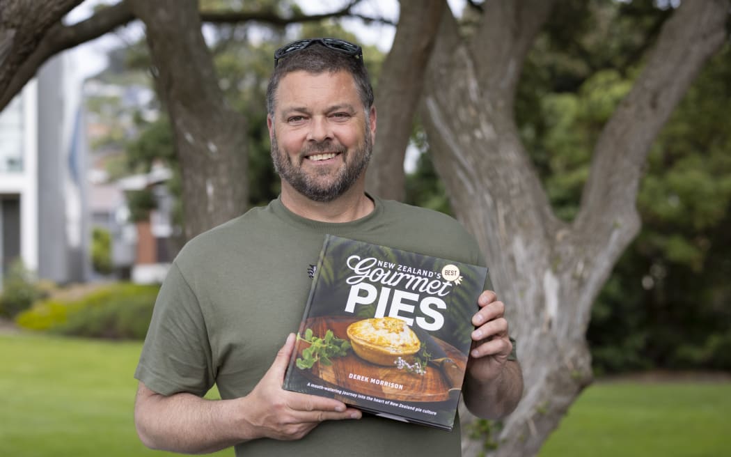 Author and photographer Derek Morrison with his latest book, New Zealand's Best Gourmet Pies