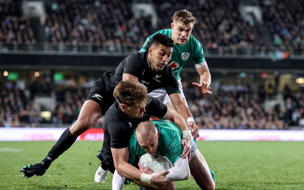 Ireland's Keith Earls scores their first try in the first Test against New Zealand.