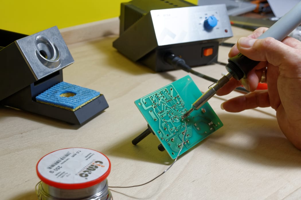 Soldering iron in use