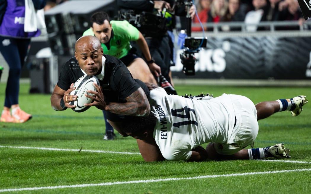 All Blacks winger Mark Tele’a scores the opening try during the New Zealand All Blacks v England, 2nd Test at Eden Park.