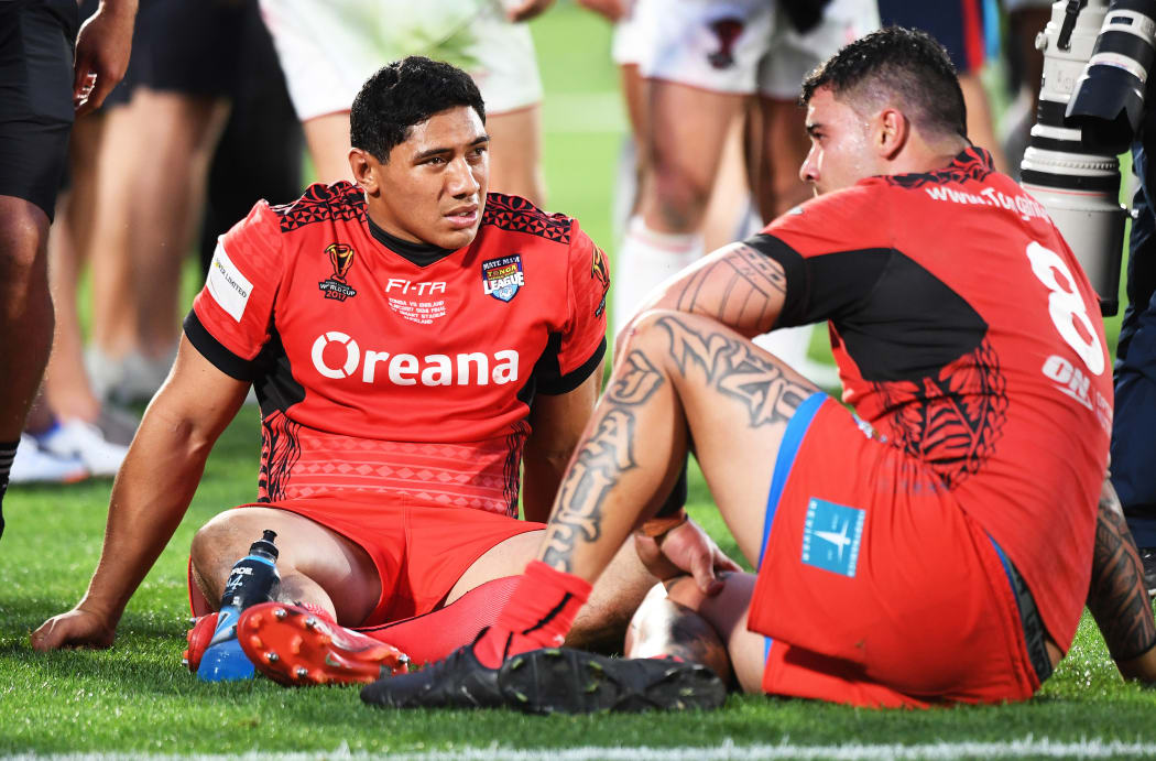 Jason Taumalolo and Andrew Fifita at the end of the narrow 20-18 loss to England.