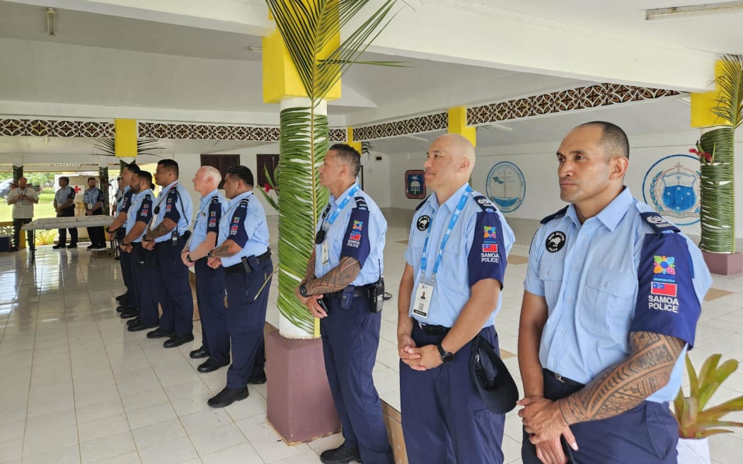 Samoan police officers line up during an event highlighting the Pacific Policing Initiative during the Commonwealth Heads of Government Meeting in Samoa.
