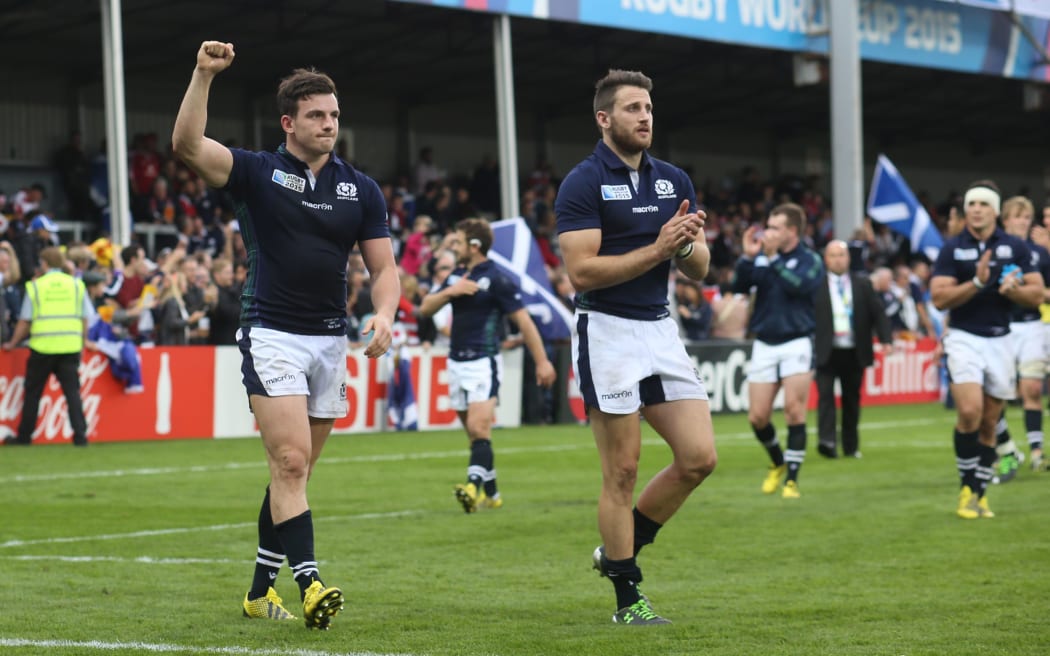 Scotland's Tommy Seymour and Matt Scott complete a lap of honour following their win over Japan at the Rugby World Cup 2015.