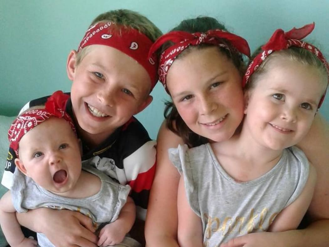 Grant and Emma Henson's children, Carys 11, Kahn 10, Caoimhe 3 and Steele, 6 months. Flooding left them unable to access their house.