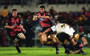 Mark Robinson in action during the rugby union Super 12 final between the Crusaders and Brumbies, Jade Stadium, Christchurch, 25 May, 2002. Photo: PHOTOSPORT