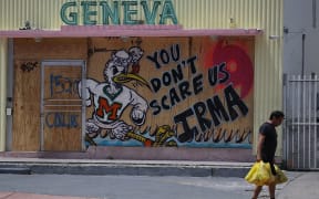 Shops and houses have been bordered up in Miami Beach, Florida, as the state braces for Hurricane Irma