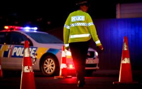 A police officer at an alcohol check point.