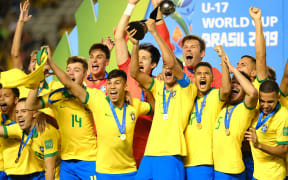 Players of Brazil celebrate their 2-1 win over Mexico in the 2019 Under-17 World Cup final
