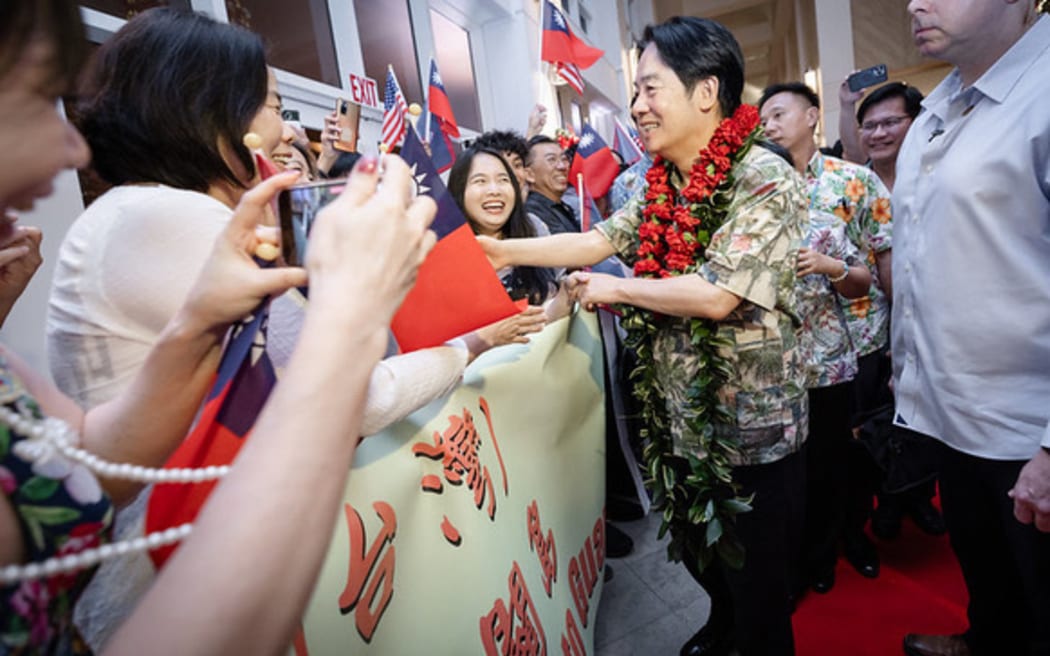 Taiwan (Republic of China) President Lai Ching-te is greeted by the Taiwanese community in Guam at Hyatt Regency Hotel lobby shortly after his arrival on Wednesday, 4 December 2024.
