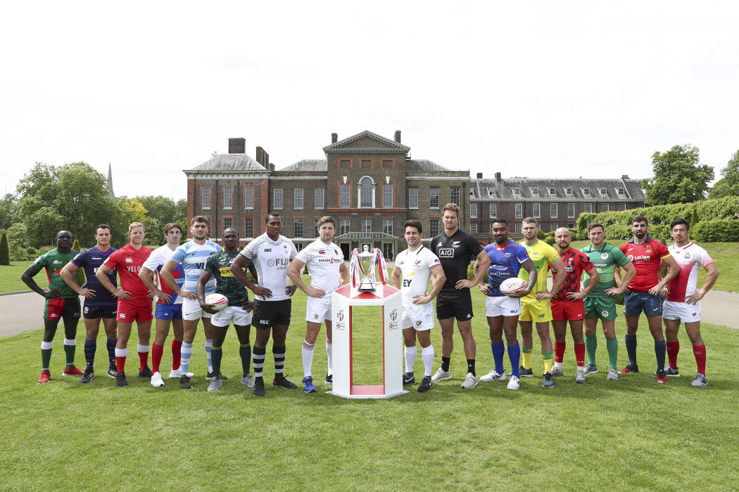 The 16 team captains, including Fiji's Paula Dranisinukula and Samoa's David Afamasaga pose at Kensington Palace in London.