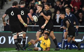 All Blacks celebrate Beauden Barrett's try.