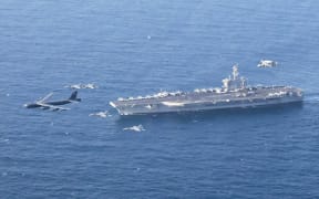 The USS Abraham Lincoln and three accompanying destroyers left the South China Sea and began heading to the Middle East last week.