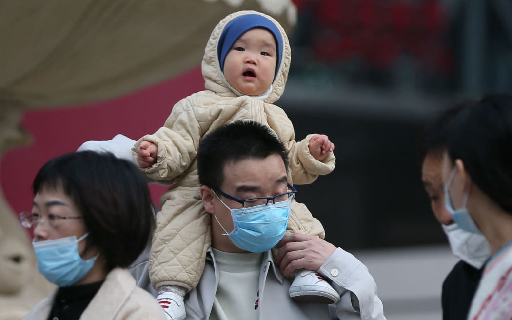 A baby is seen in Beijing, China on March 11, 2021.China considers new actions to lift flagging birthrate.( The Yomiuri Shimbun ) (Photo by Koki Kataoka / Yomiuri / The Yomiuri Shimbun via AFP)