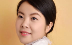 China Face – Students have this photo and a few clues to find this woman in China