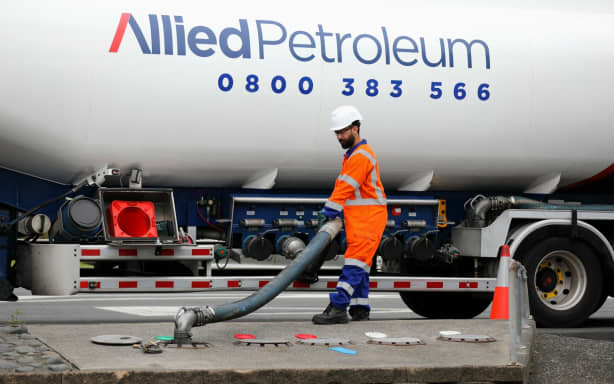 A petrol tanker refuels pumps at Gull petrol station in Torbay