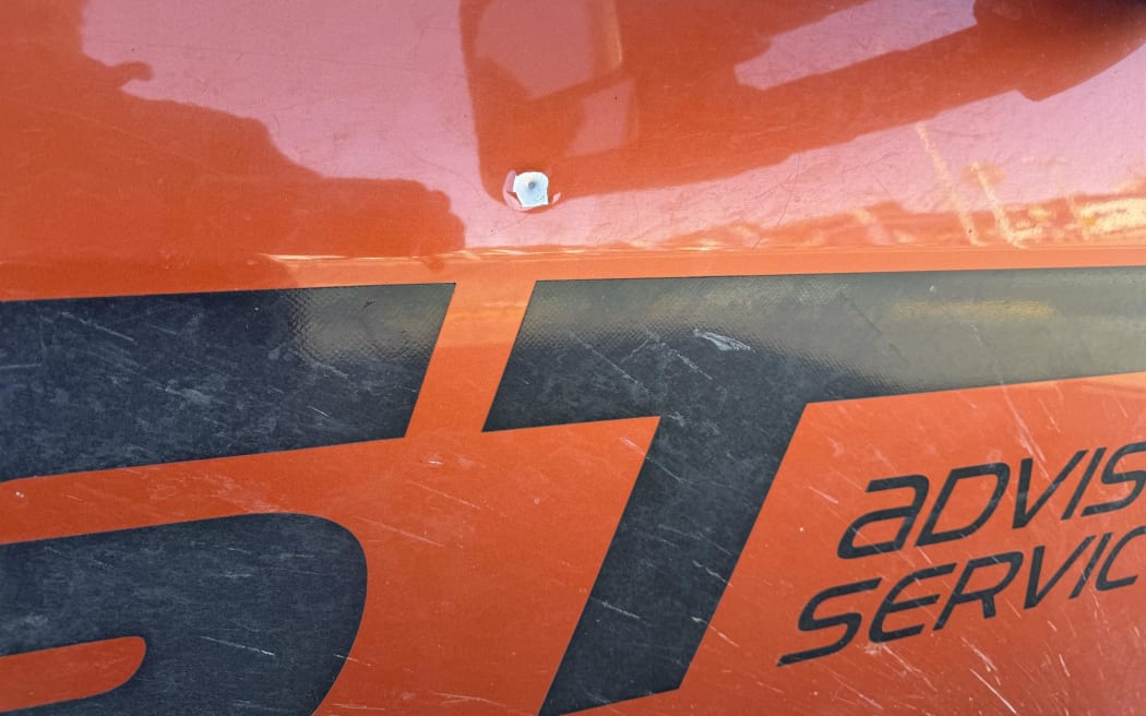 Murray Chong's distinctive orange ute was hit by a single shot while parked outside his home.