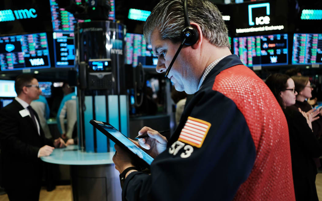 Traders work on the floor of the New York Stock Exchange (NYSE) on March 03, 2020 in New York City. stocks one again fell on Wall Street as global concerns over the financial impact from the Coronavirus drive investments down.