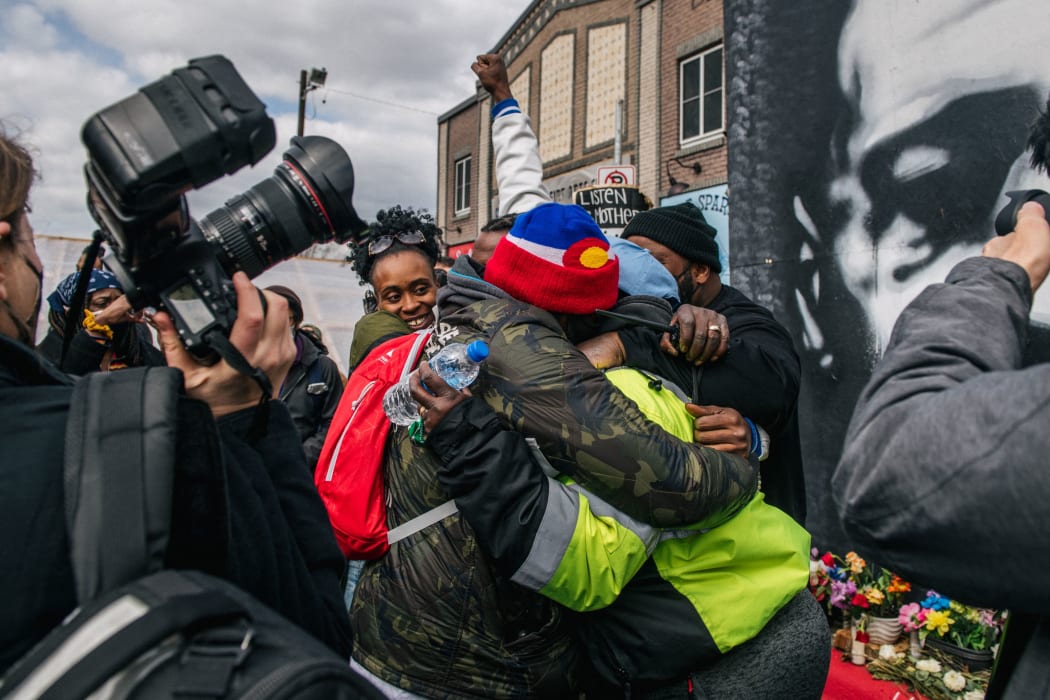 People celebrate in Minneapolis, Minnesota, after hearing the verdict in Derek Chauvin trial.