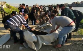 Nearly 100 dead after ferry capsizes in Iraq