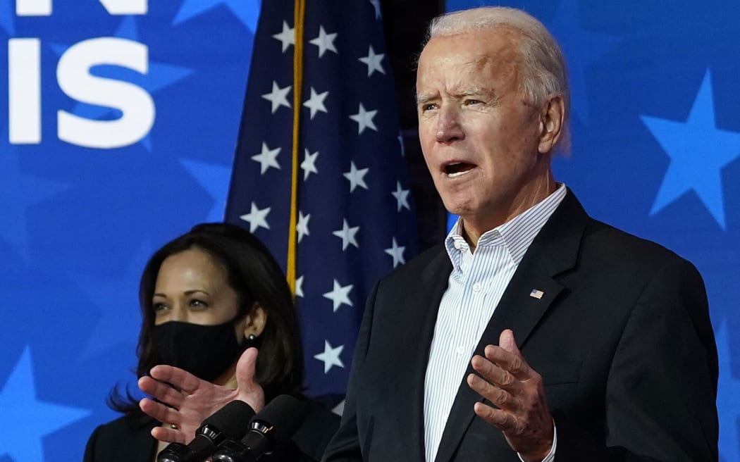 WILMINGTON, DELAWARE - NOVEMBER 05: Democratic presidential nominee Joe Biden speaks while flanked by vice presidential nominee, Sen. Kamala Harris (D-CA), at The Queen theater on November 05, 2020 in Wilmington, Delaware.