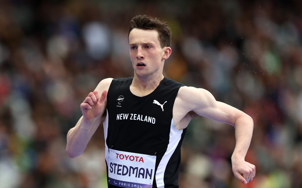 William Stedman of New Zealand on his way to silver in the Men's 400m T36 Final at the Paris 2024 Summer Paralympic Games at Stade de France.