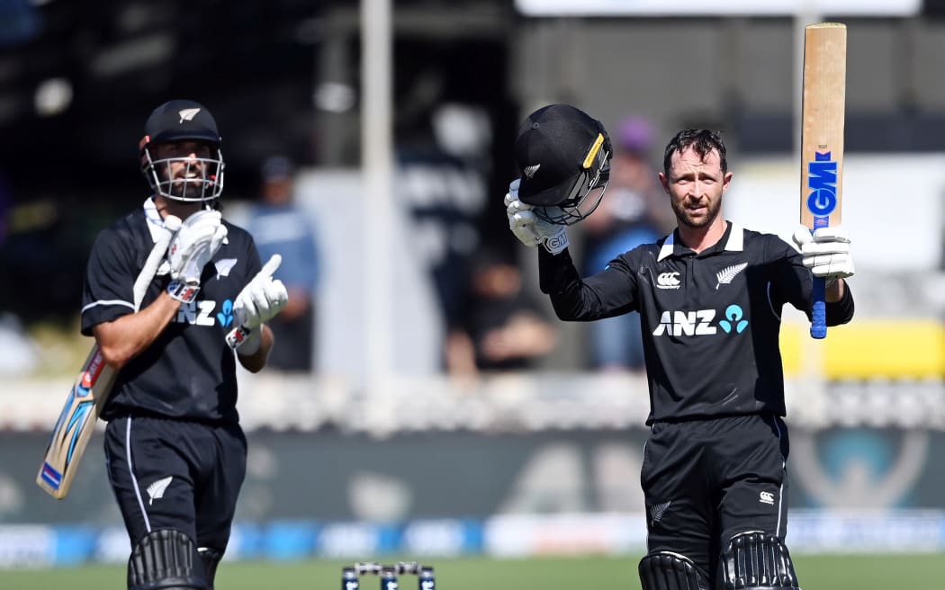 Devon Conway celebrates his first international century for New Zealand.