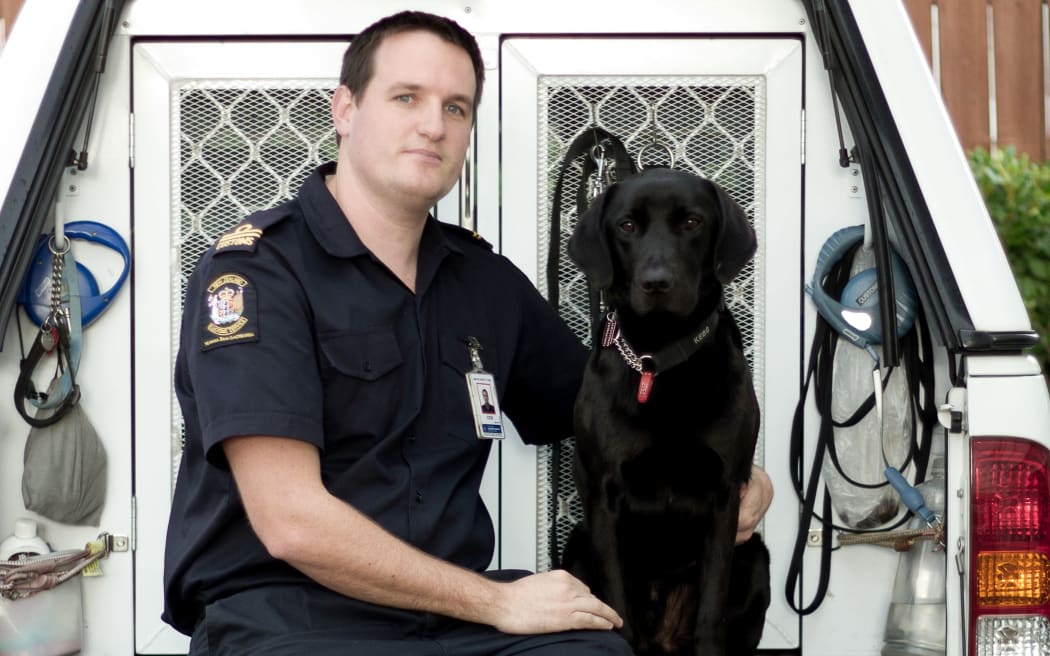 Detector dog Kane and his handler Senior Customs Officer Robert Gillanders.