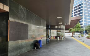 Outside the central Auckland Library on Lorne Street.