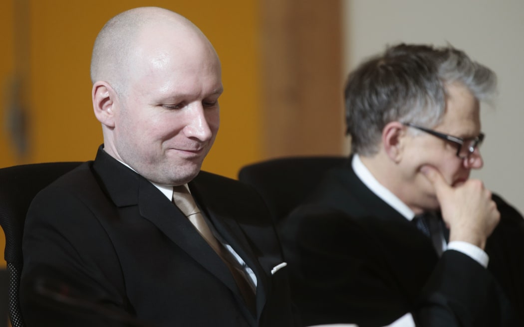Convict Anders Behring Breivik is suing the state. Anders Behring Breivik (left) and counsel lawyer Oystein Storrvik.
