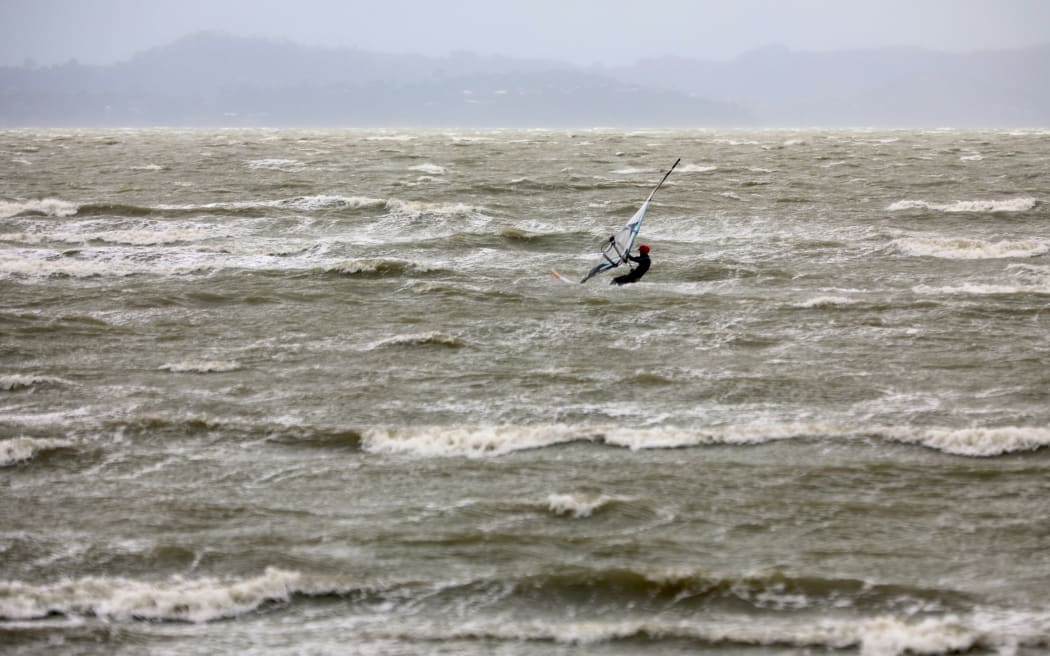 A lone wind surfer could be seen at Auckland's Eastern Beach during Cyclone Tam.
