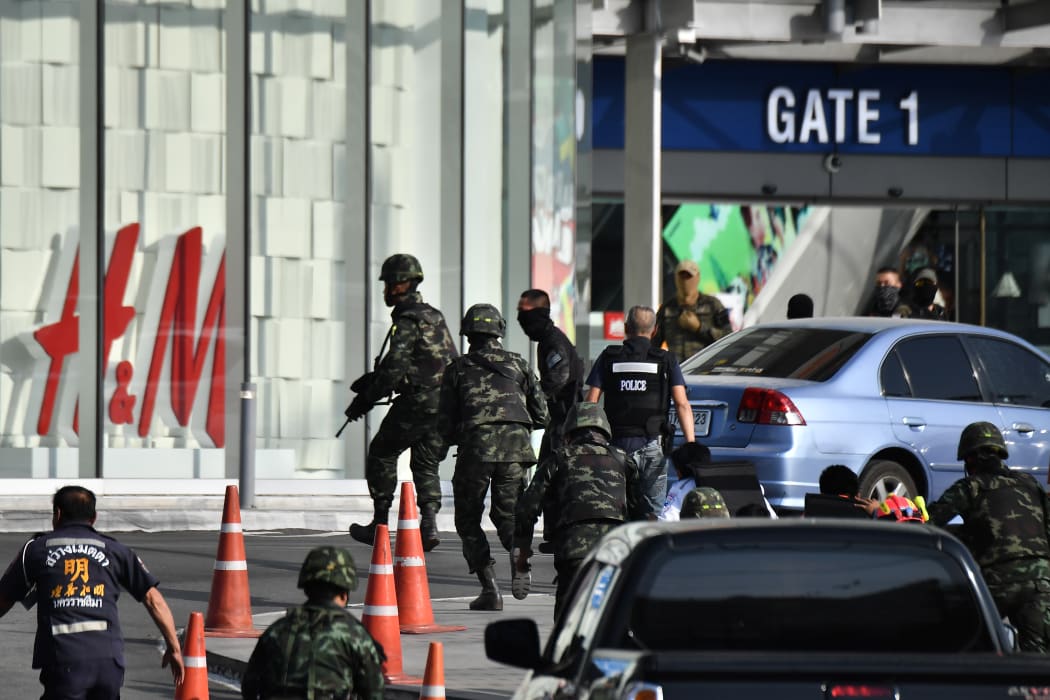 Soldiers entering the Terminal 21 mall, in the Thai northeastern city of Nakhon Ratchasima.