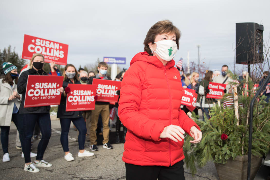 Senator Susan Collins makes her way back to her campaign bus after announcing her competitor Sara Gideon called to concede on November 4, 2020 in Bangor, Maine.