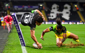 Dallin Watene-Zelezniak scores one of his four tries as the Kiwis beat Jamaica at the 2022 Rugby League World Cup.