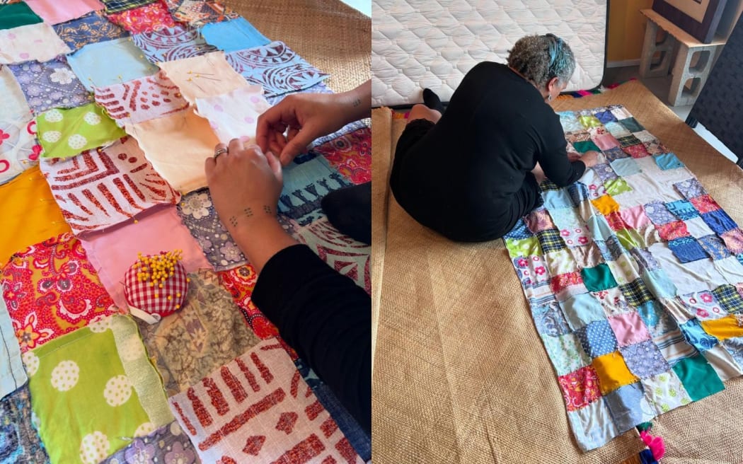 Last-minute touches being added to a quilt.