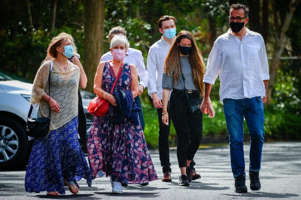 Mother Vinciane Delforge (left), grandmother Jacqueline Jourquin (second L), and father Laurent Hayez (right) pictured at the start of the Coroner's inquest