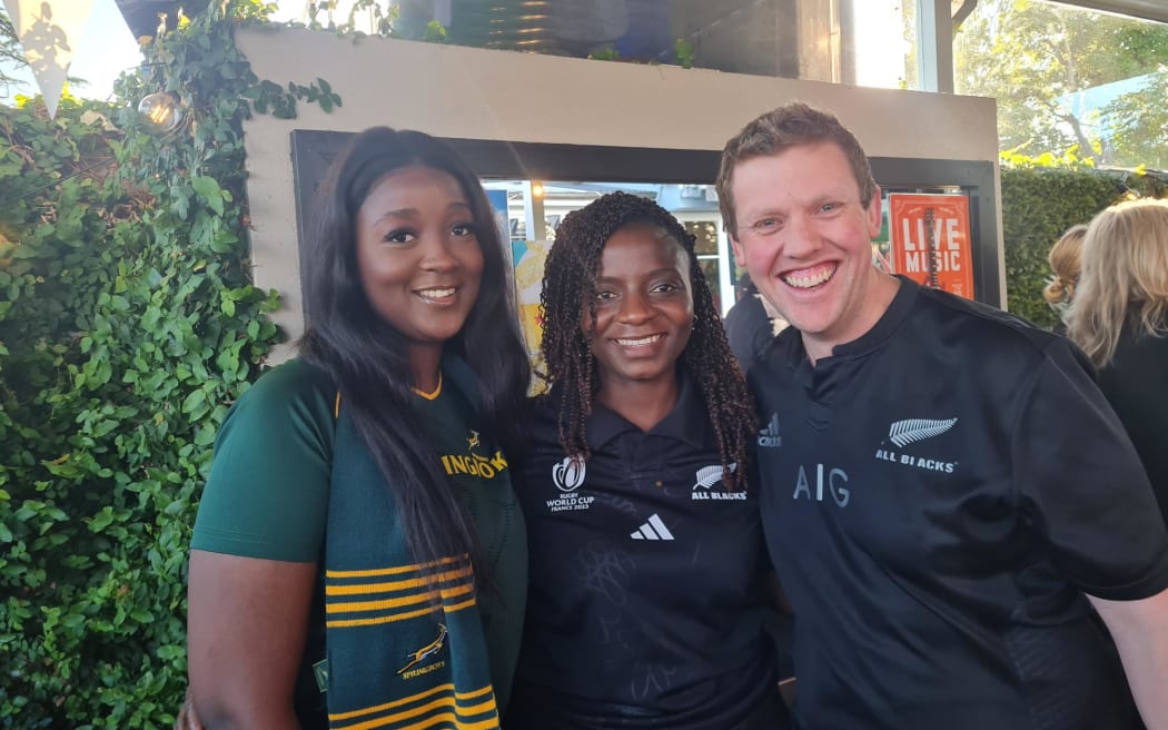 (L-R) Claire Shoko, Rudo Tagwireyi and Caleb Vercoe enjoy the Rugby World Cup final buildup at Christchurch's No.4 restaurant and bar on 29 October, 2023.