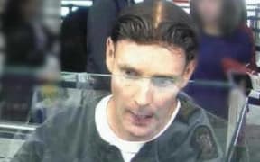 CCTV footage of  Phillip Smith as he passed through Auckland Airport.