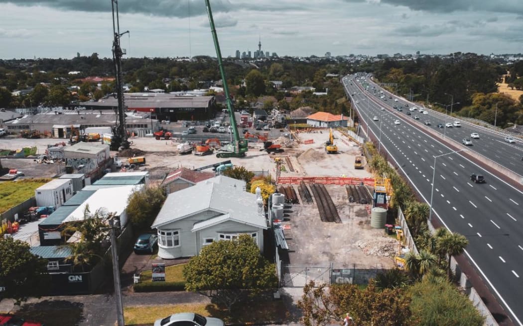 Last house standing - the owner of this 1920s bungalow in Parr Rd North, Point Chevalier has held out as long as he could against the construction of Foodstuffs’ New World supermarket on land all around his house. But now he’s selling.