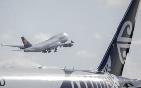 A Lufthansa aircraft repatriating German tourists takes off headed to Frankfurt from Christchurch Airport in Christchurch on April 8, 2020.