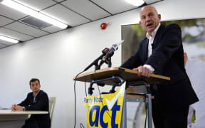 Jamie Whyte speaking to reporters in Auckland with Epsom candidate David Seymour in the background.