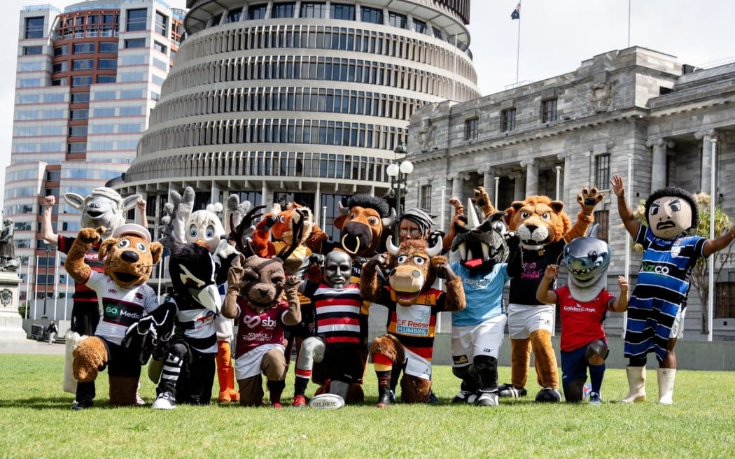 Mascots of NPC and Heartland teams outside the Beehive.