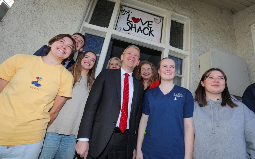 Labour Party leader with the occupants of the Dunedin flat known as The Love Shack.