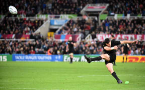 Dan Carter takes a shot at goal in the Rugby World Cup match against Tonga.