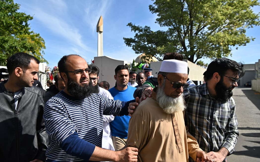 Members of the Muslim community leave the Al Noor Mosque in Christchurch, after it was opened to members of the public in groups of 15 at a time.