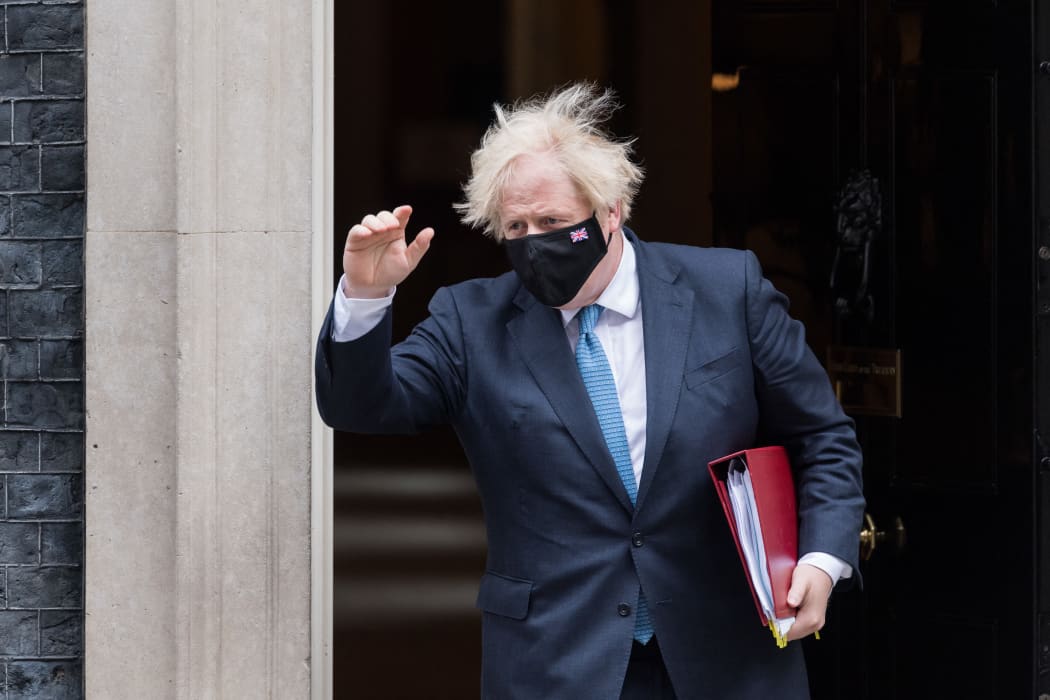 British Prime Minister Boris Johnson leaves 10 Downing Street for PMQs at the House of Commons.