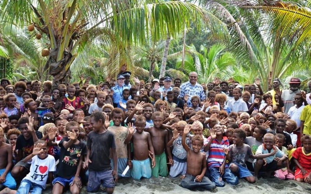 Locals gather to meet with RAMSI staff in  Guadalcanal.