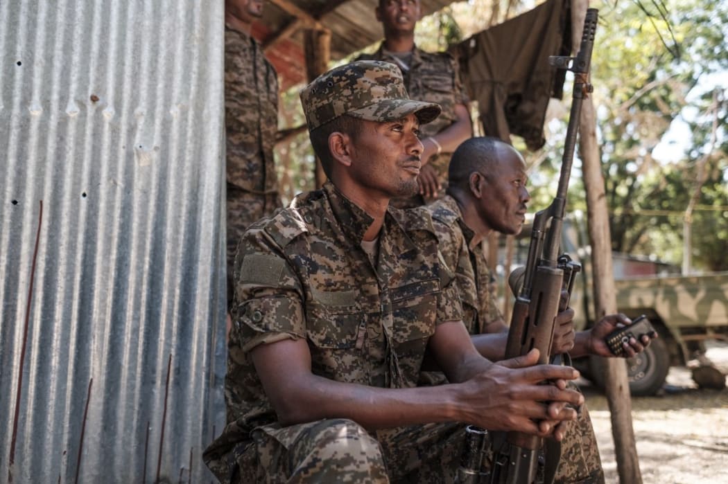 Ethiopian soldiers rest at the 5th Battalion  of the Northern Command of the Ethiopian Army in Dansha, Ethiopia, on November 25, 2020.
