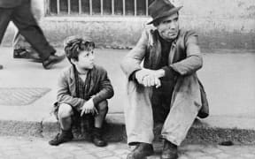 Movie still from 1948 Italian neorealist film Bicycle Thieves