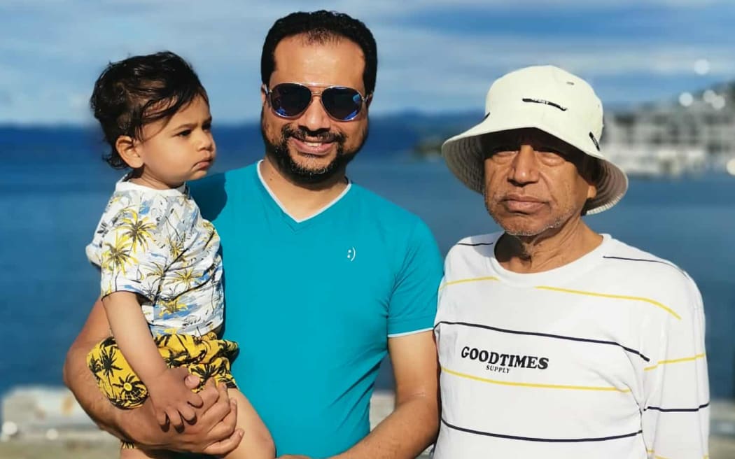 Prem Khanal, with his father and son at Wellington water front in 2022.